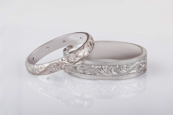 Platinum wedding ring set with paisley engraving