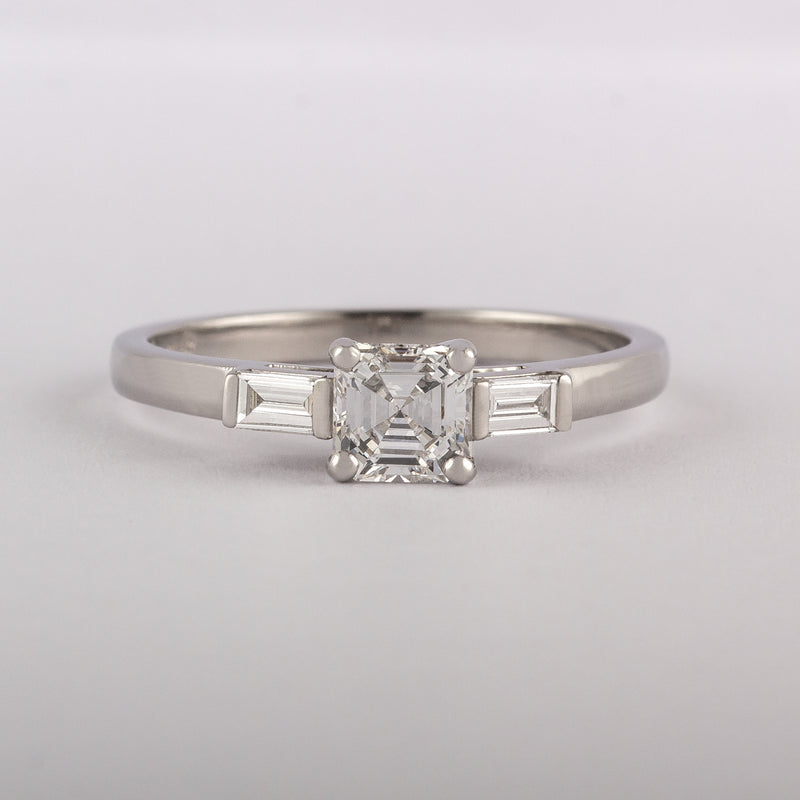 Asscher cut diamond ring with baguettes in platinum