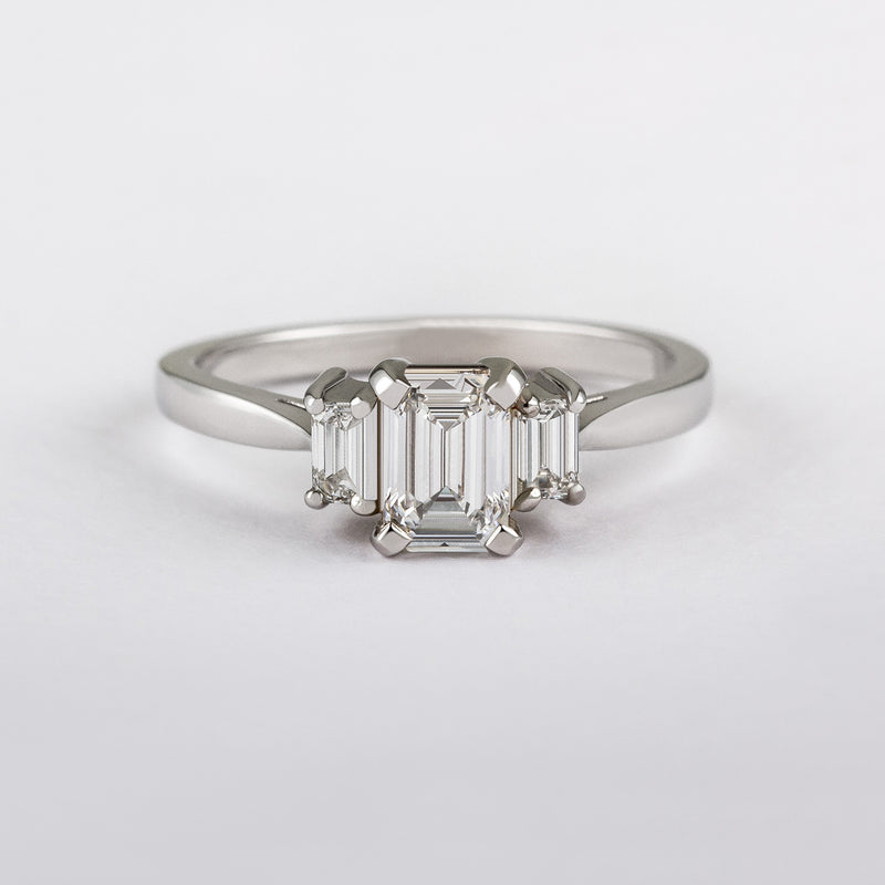 Emerald cut diamond 3 stone engagement ring