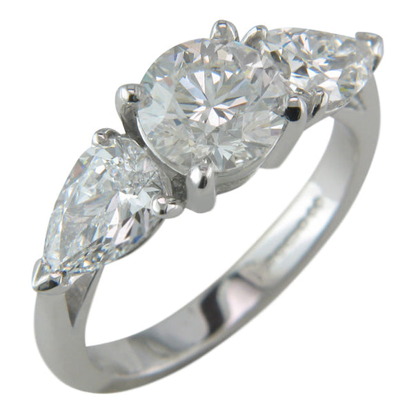 Lab grown diamond three stone ring with pear cut side diamonds