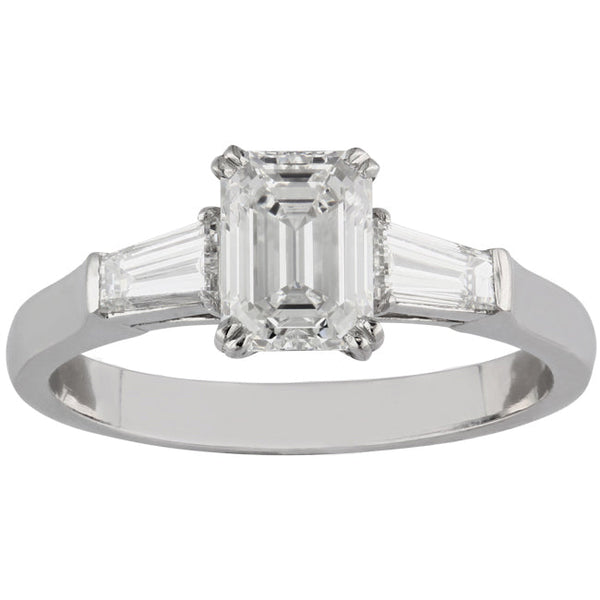Lab grown emerald cut engagement ring with tapered baguette shoulders