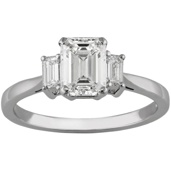 Lab grown emerald cut trilogy engagement ring in platinum