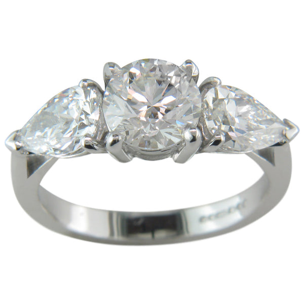 Lab grown three stone diamond ring with pear sides in platinum