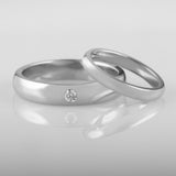 Men's and women's matching platinum wedding rings set