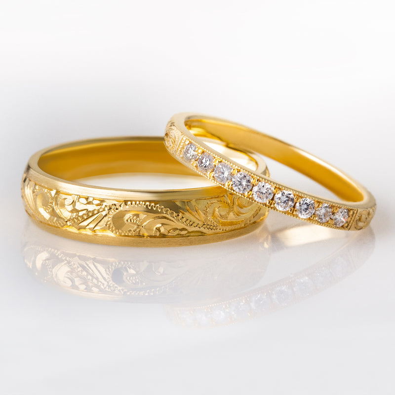 Paisley engraved yellow gold wedding ring set for bride and groom