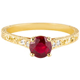 Round ruby ring in yellow gold with engraved diamond band