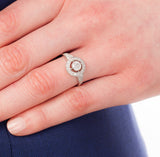 Diamond cluster ring in platinum on hand