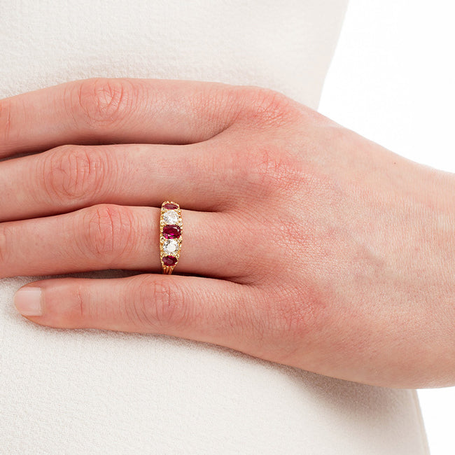 Ruby and diamond ring on hand