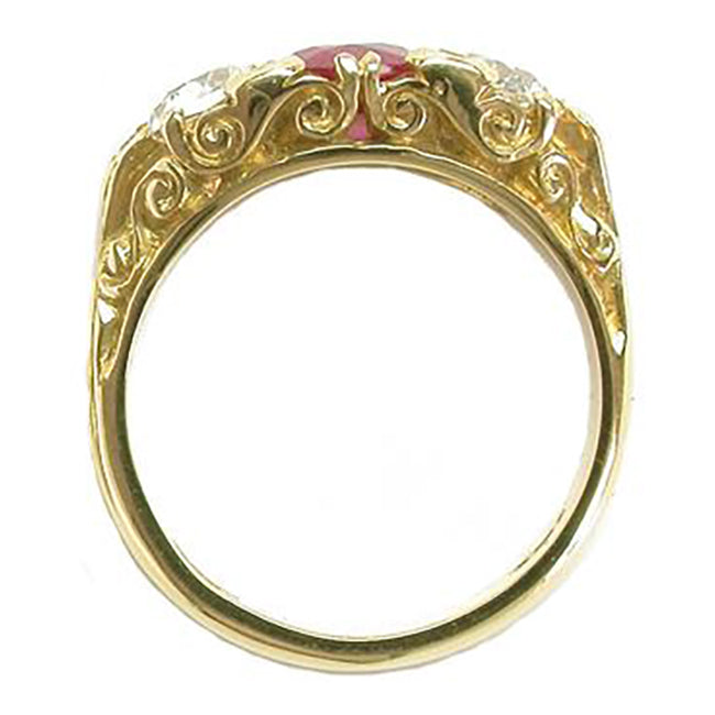 Ruby anniversary ring with diamonds in three stone vintage style.