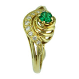 Emerald comet ring with spiral of diamonds