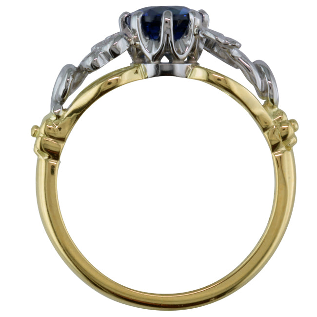 Naturalistic floral design sapphire and diamond ring.