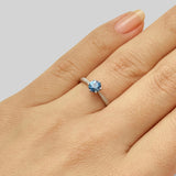 Aquamarine engagement ring on hand