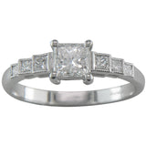 Diamond and platinum ring with princess cut diamond shoulders from UK diamond merchants.