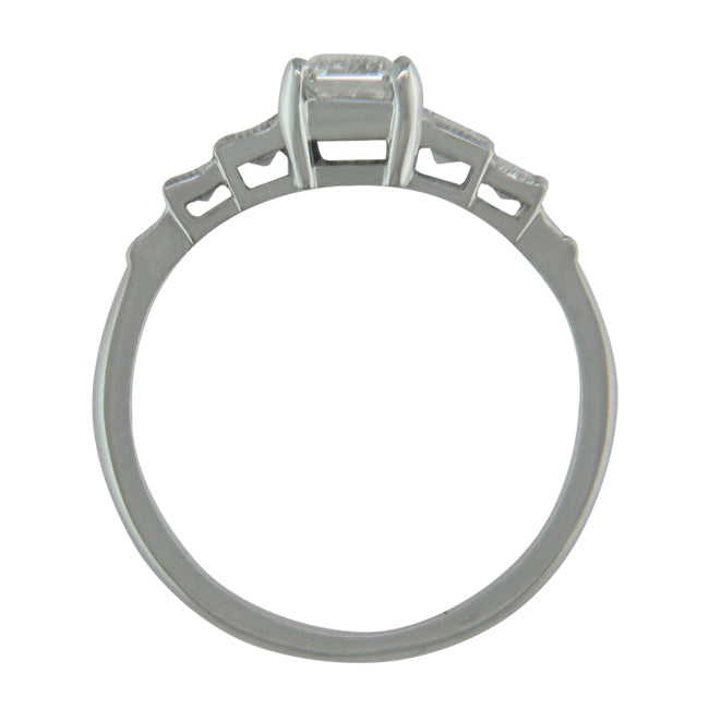 Side view of emerald cut diamond engagement ring mount in platinum or gold.