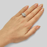 Asscher cut diamond cluster engagement ring in platinum