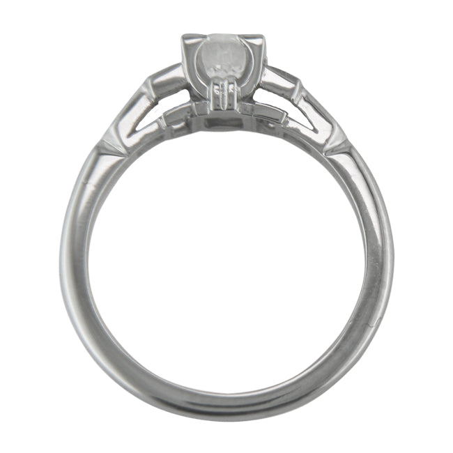 Unique Diamond and Platinum Ring with Baguette Diamond Shoulders