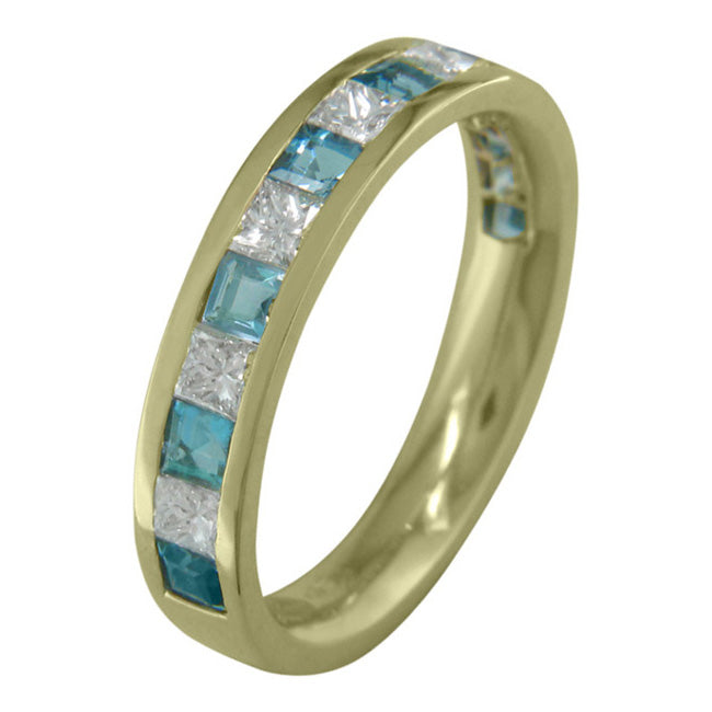 Yellow gold aquamarine and diamond eternity ring