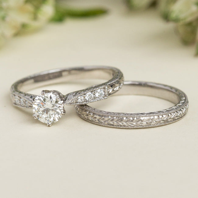 Engraved laurel wedding ring in platinum