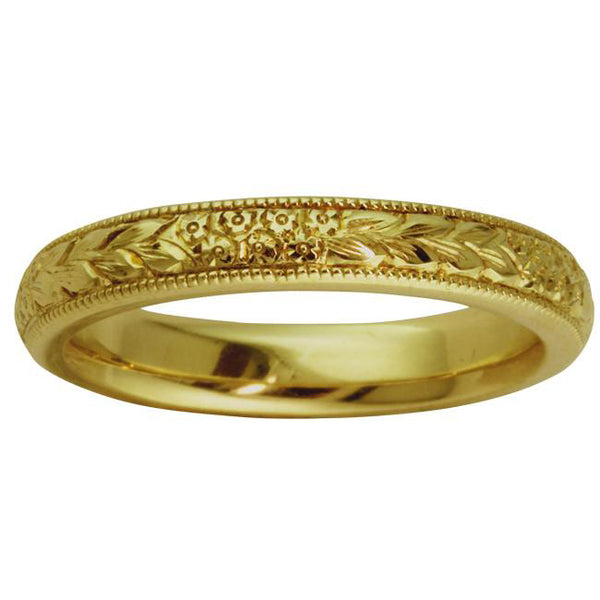 Engraved forget-me-not floral wedding ring in yellow gold
