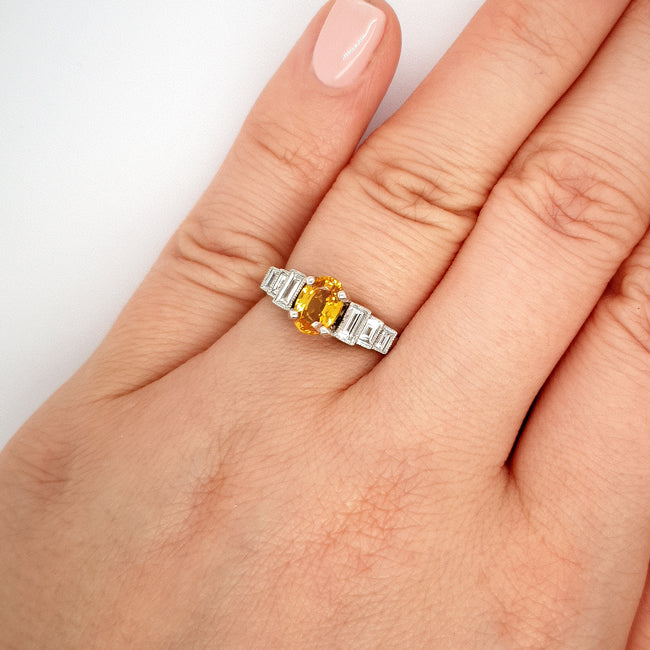 Yellow sapphire and baguette diamond ring