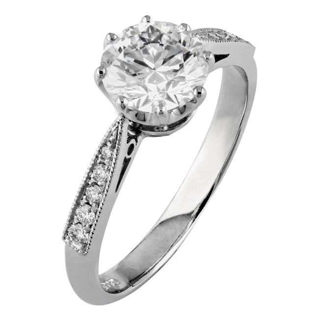 Vintage one carat solitaire ring with diamond band