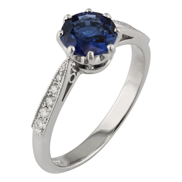 Sapphire ring with diamond accent band
