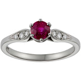 Round ruby engagement ring with diamonds in platinum