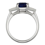 Cushion cut sapphire and triangle diamond 3-stone ring