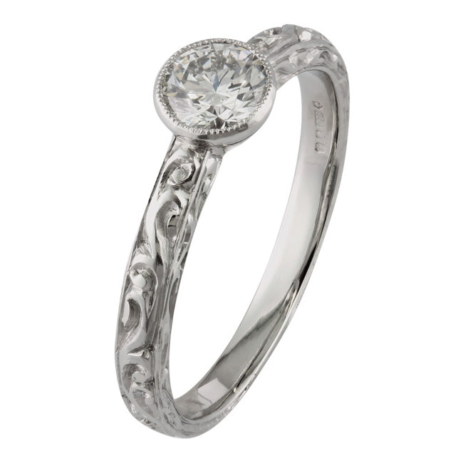 Bezel set engraved engagement ring
