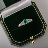 floral platinum and emerald ring