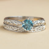 Aquamarine engagement ring with matching vintage wedding ring