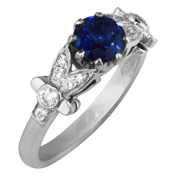 Edwardian style sapphire ring with diamond band
