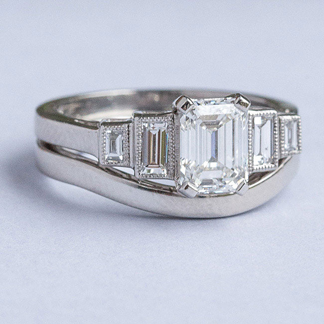 Emerald cut diamond ring with wedding ring in platinum