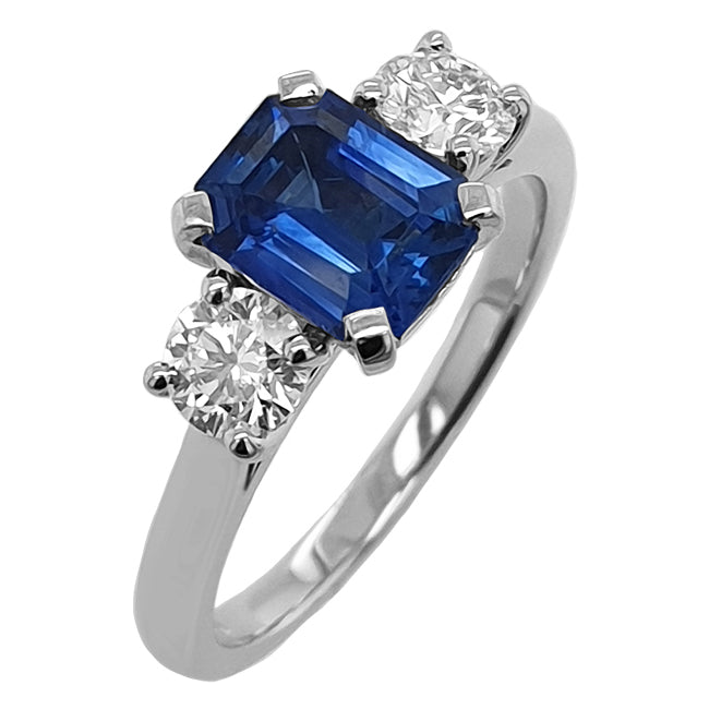 Emerald Cut Sapphire and Round Diamond Trilogy Ring in Platinum