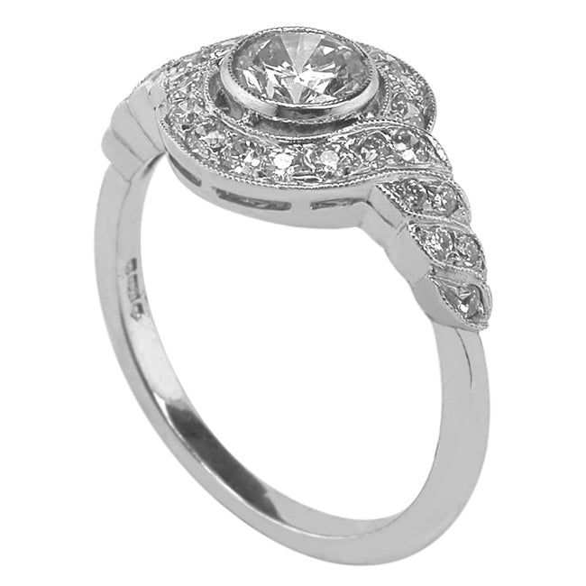 Elegant Diamond Cluster Ring with Spiral Shoulders