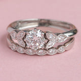 Vintage inspired engagement ring and wedding ring set in platinum