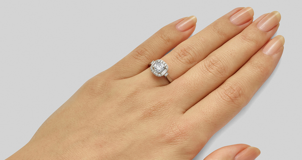 Cushion cut diamond cluster ring with diamond baguettes