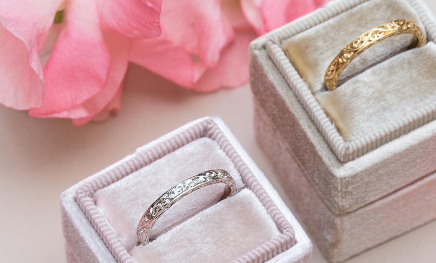 Platinum and gold engraved engagement rings