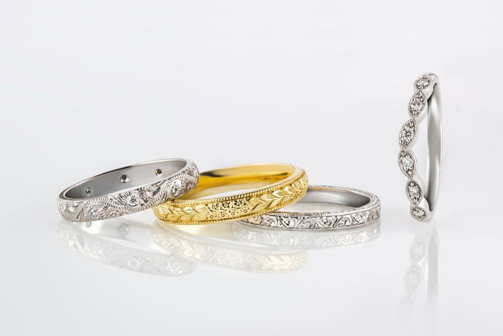 Engraved wedding rings made in Britain by London jewellers.