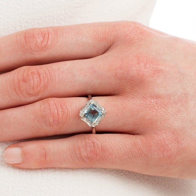 Art Deco aquamarine cluster ring on hand
