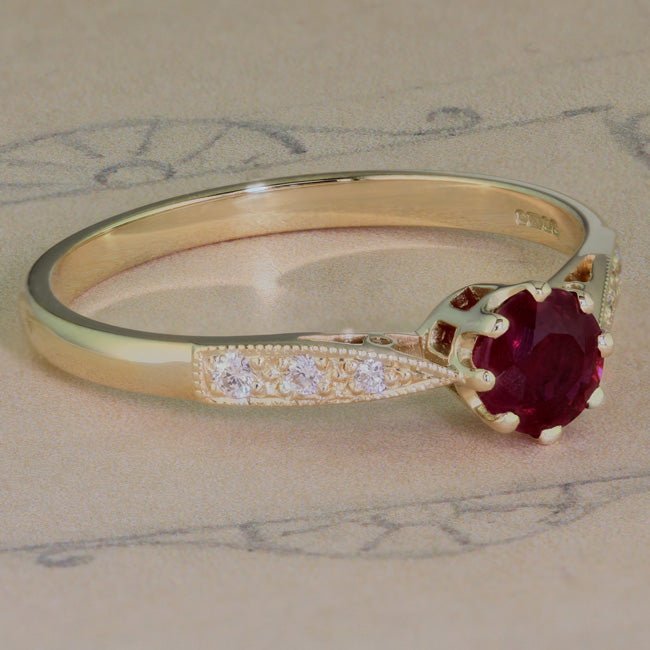 Ruby engagement ring on paper