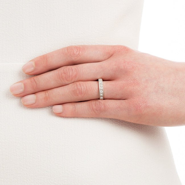 0.50ct diamond band in white gold on model hand