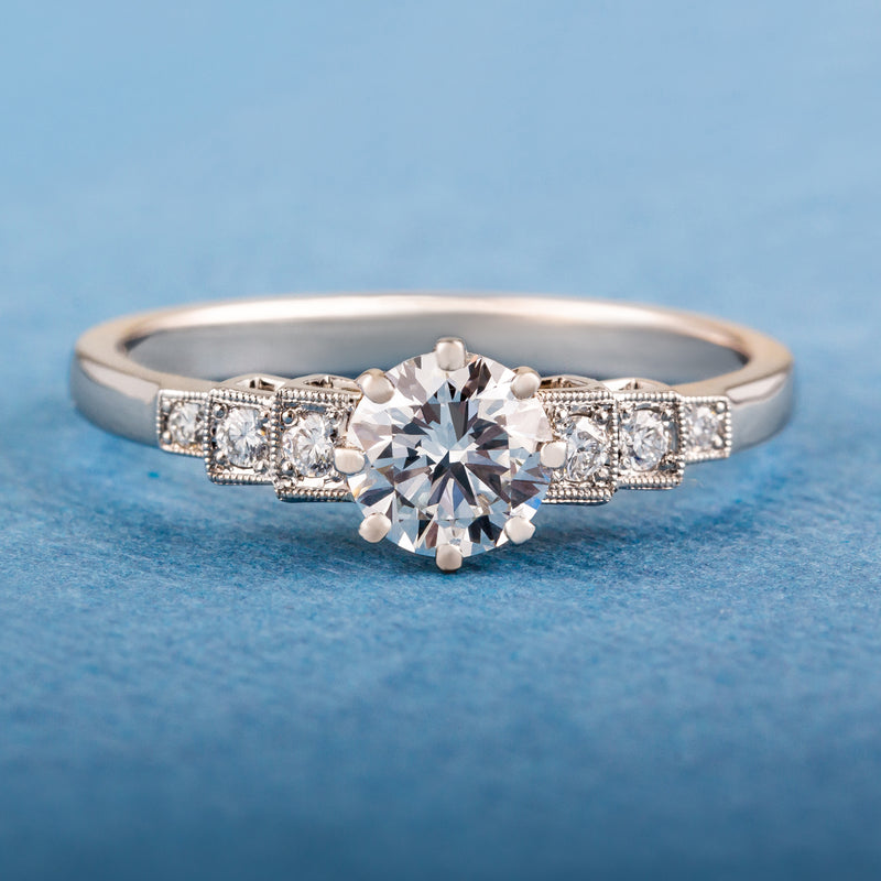 Art Deco diamond stepped shoulder engagement ring