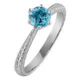 aquamarine engagement ring in platinum engraved in floral and vintage style