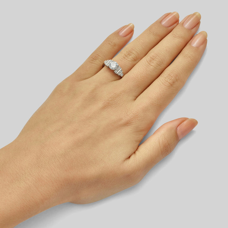 Round diamond ring with diamond band in the Art Deco style