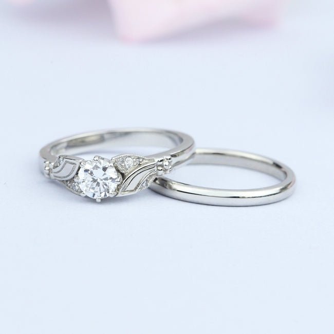 Floral engagement ring with simple band