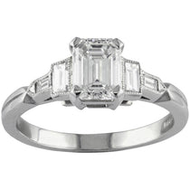 Vintage emerald cut diamond ring with baguettes