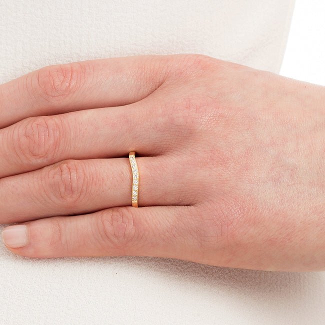 Shaped Diamond & Yellow Gold Wedding Ring on hand