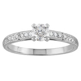 hand engraved ring with diamonds and millegrain edging 