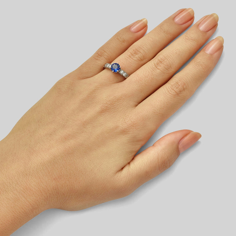 Unusual engraved sapphire ring in platinum